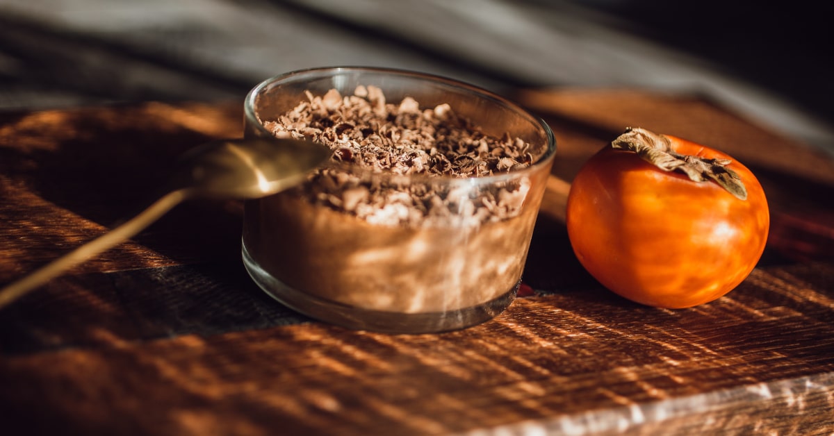Mousse di cacao, cachi e olio essenziale