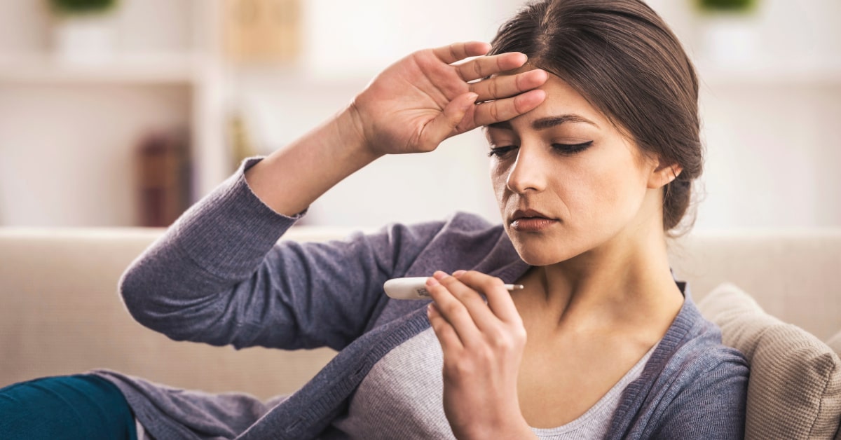 Donna con sintomi influenzali, difese basse